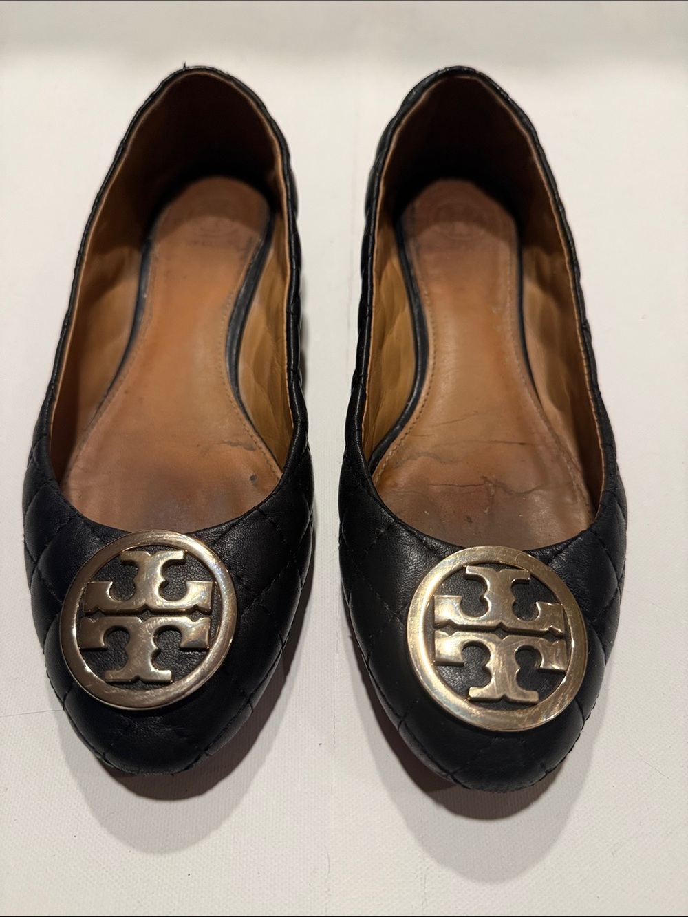 Tory Burch Black Quilted Leather Flats with Gold Logo Medallions